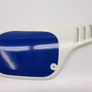 Cache latéral droit NH-138 blanc avec autocollant bleu MTX125R NOS