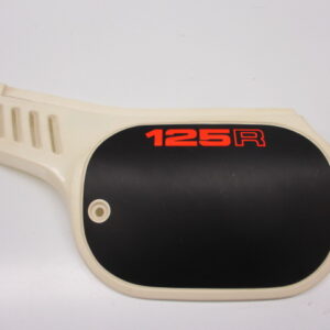 Cache latéral gauche NH-111 blanc MTX125R NOS